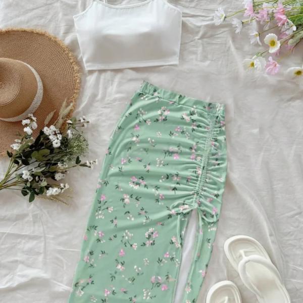 طقم ملابس للنساء موديل 2 قطع، تيشيرت كاجوال للعطلات، وتنورة فسكوز طويلة مفتوحة الجانب بطبعات زهرية